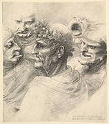 Five grotesque heads, including an elderly man with an oak leaf wreath