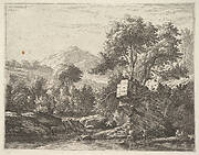 Two men standing ankle-deep in a body of water with a rocky outcrop behind them, to the left a rocky bank, trees and a hilltop beyond