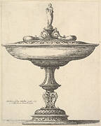 A  wide cup with ornamental stem